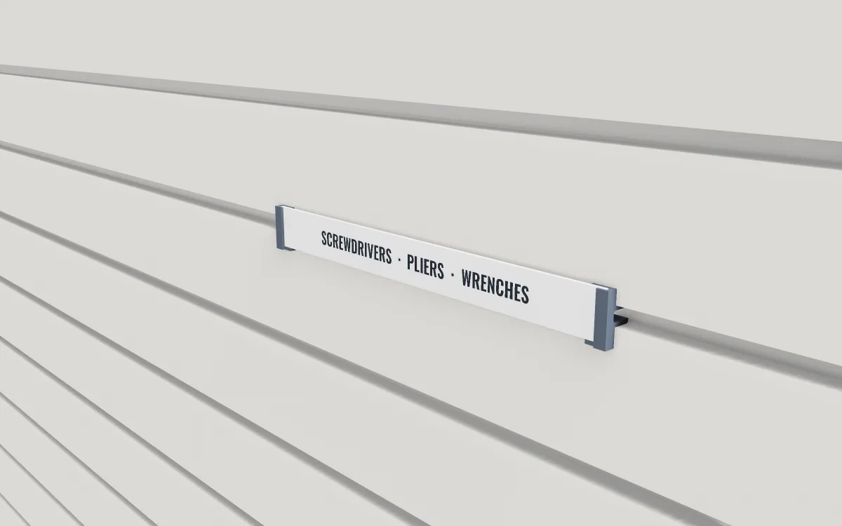 Groove label strip · Slim under a shelf on a slatwall, 3D render