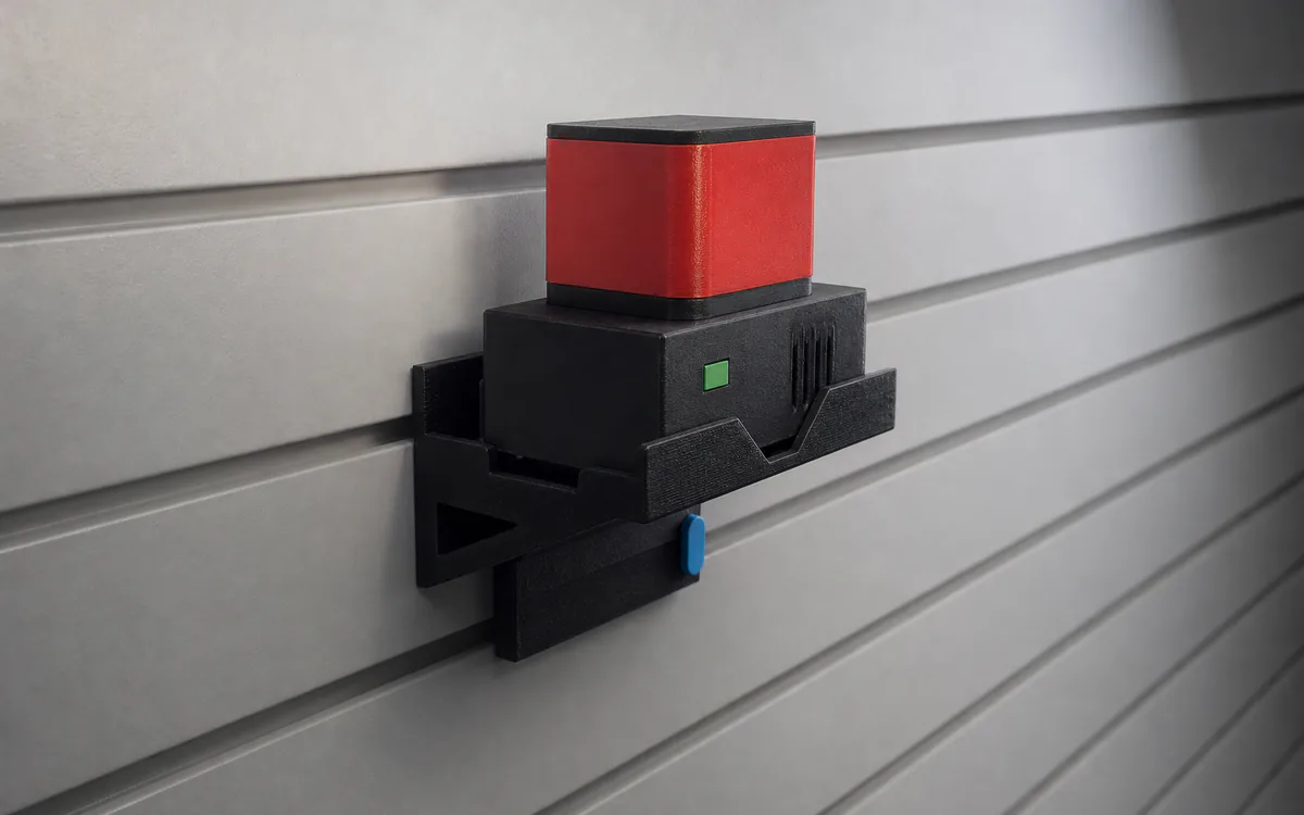 Power-tool charger tray on slatwall, holding a charger with a battery