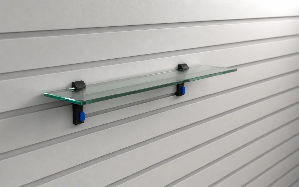 Glass-shelf rests on slatwall, a pair holding a glass shelf